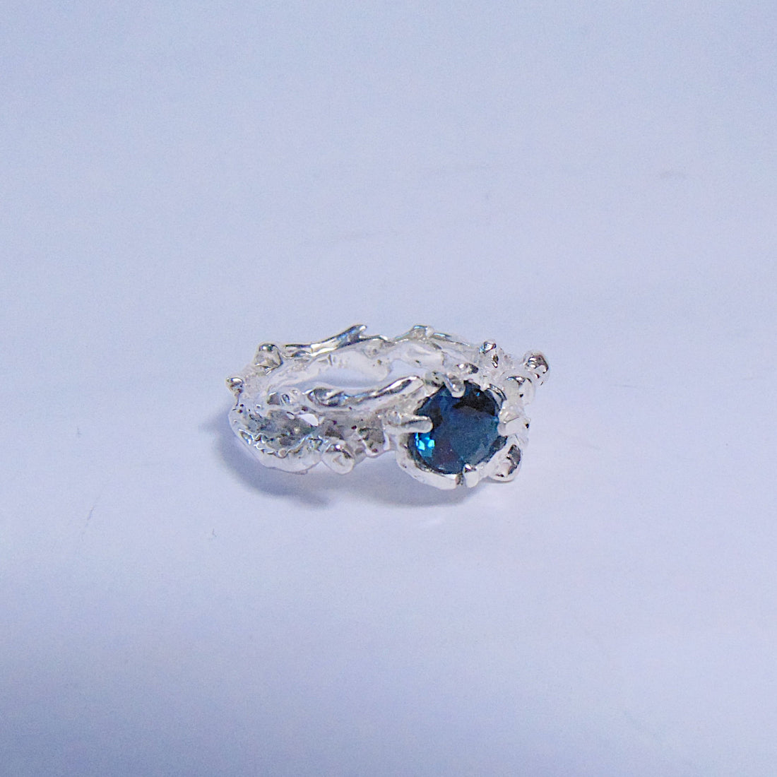 Pierścionek srebrny z Topazem London Blue